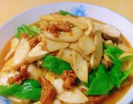 鸡腿菇炒肉怎么做？